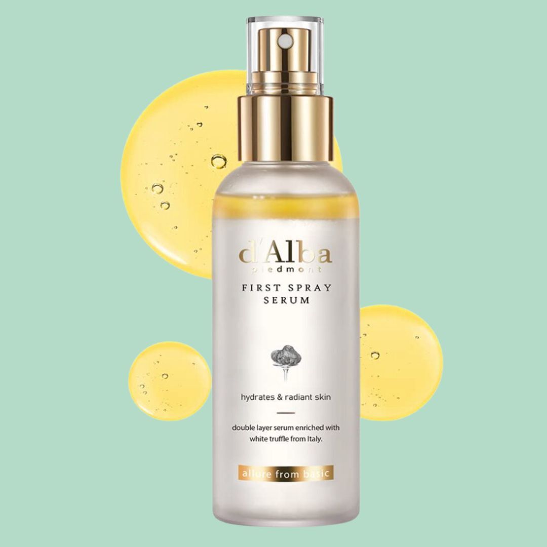 Serum vessel with "d'Alba First Spray Serum" text, highlighted against yellowish circles. Claims to hydrate and heighten tegument with Italian achromatic truffle