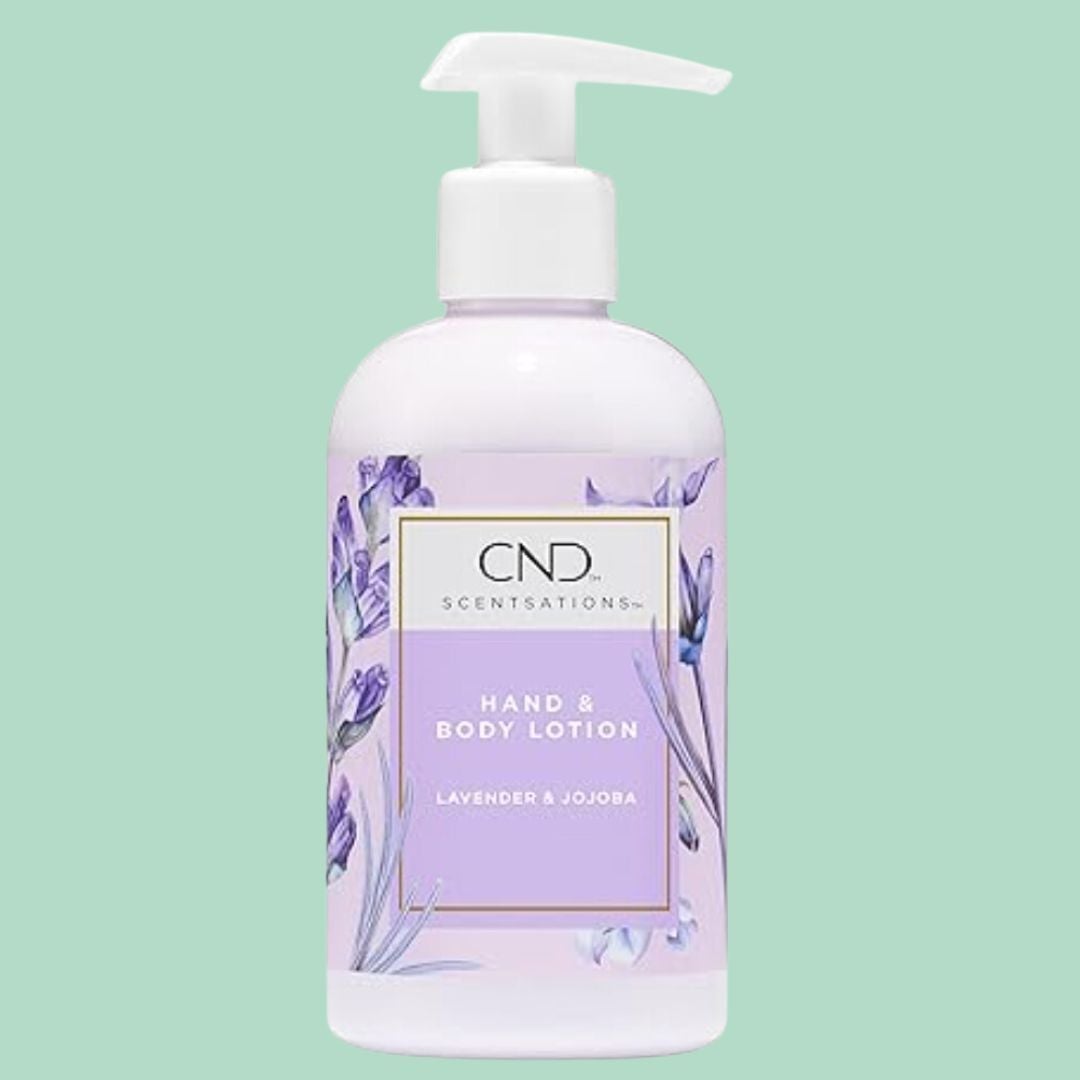 CND Scentsations Hand & Body Lotion vessel with lavender and jojoba scent, featuring purple floral plan connected the statement against a plain backdrop