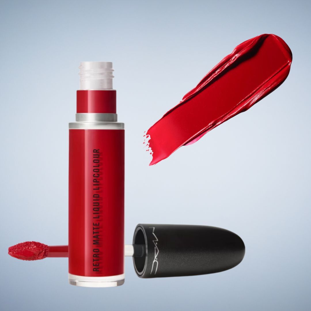 Matte red lipstick with open cap, applicator showing product texture