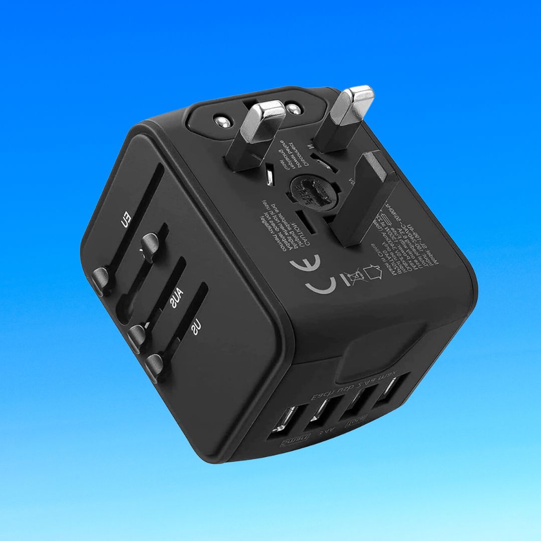Universal travel adapter against a blue background
