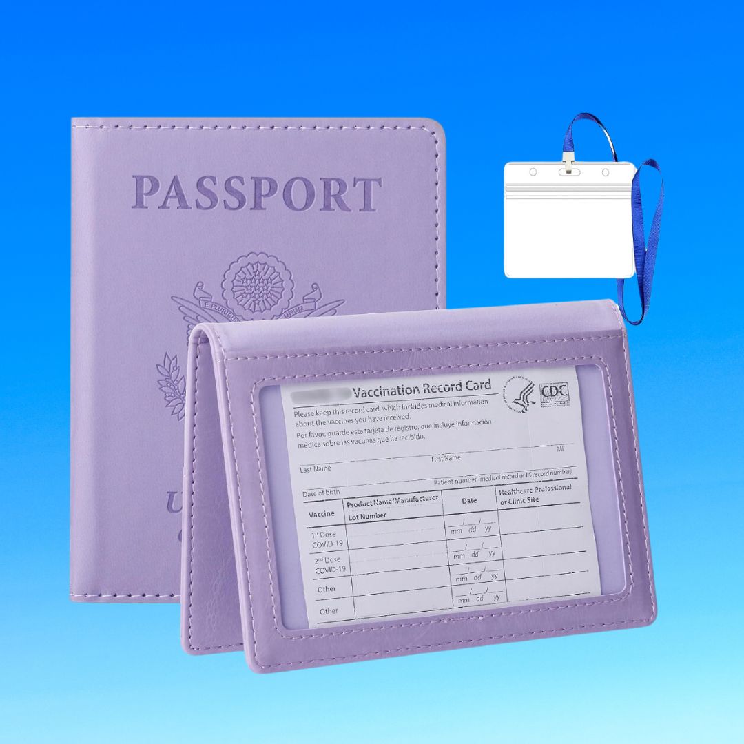 Passport and vaccination record card against a blue background