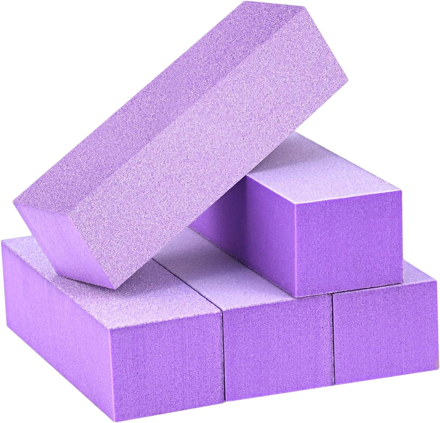 Five purple yoga blocks stacked in an asymmetric pattern