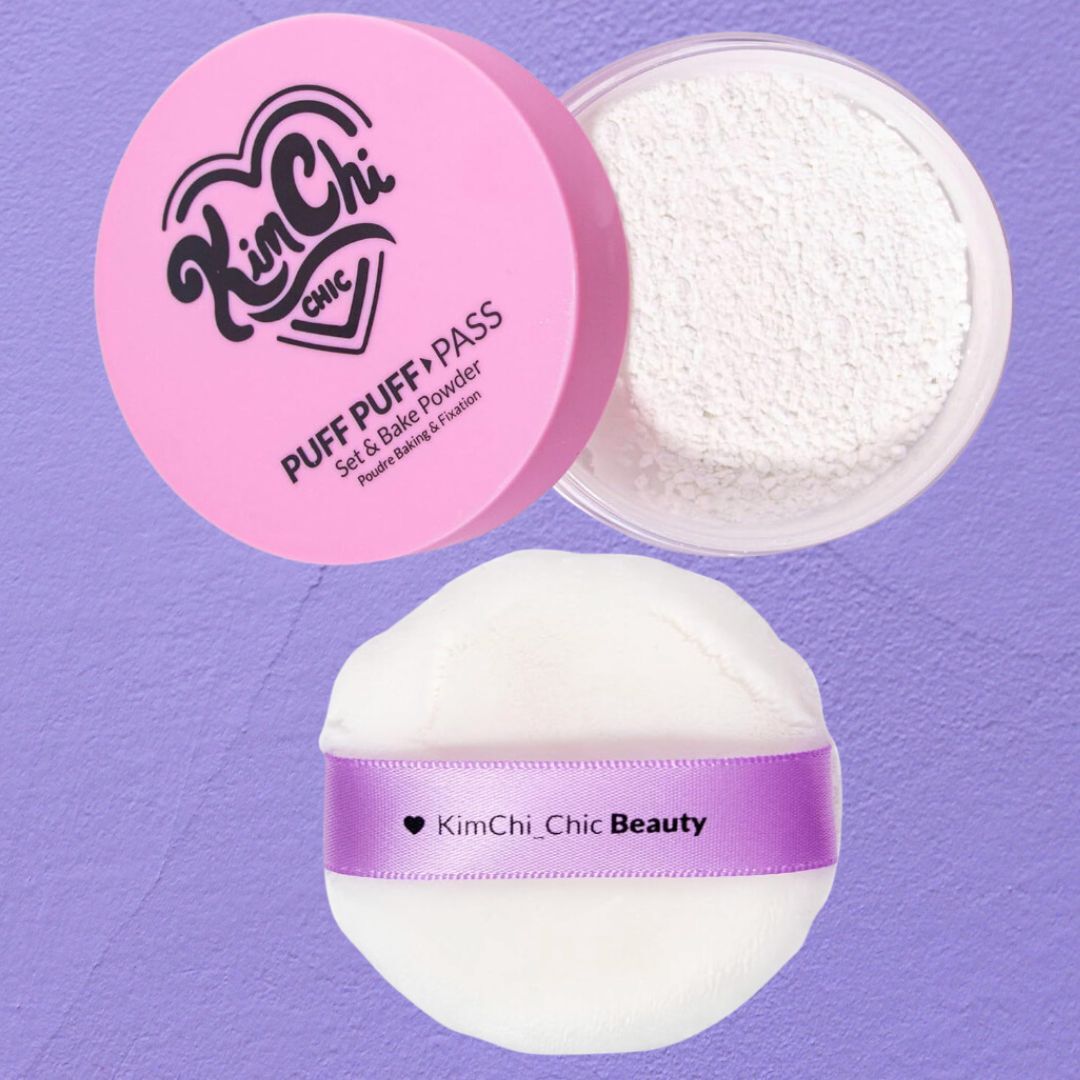 KimChi Chic Beauty&#x27;s Puff Puff Pass setting powder with lid open, puff on top, against purple background