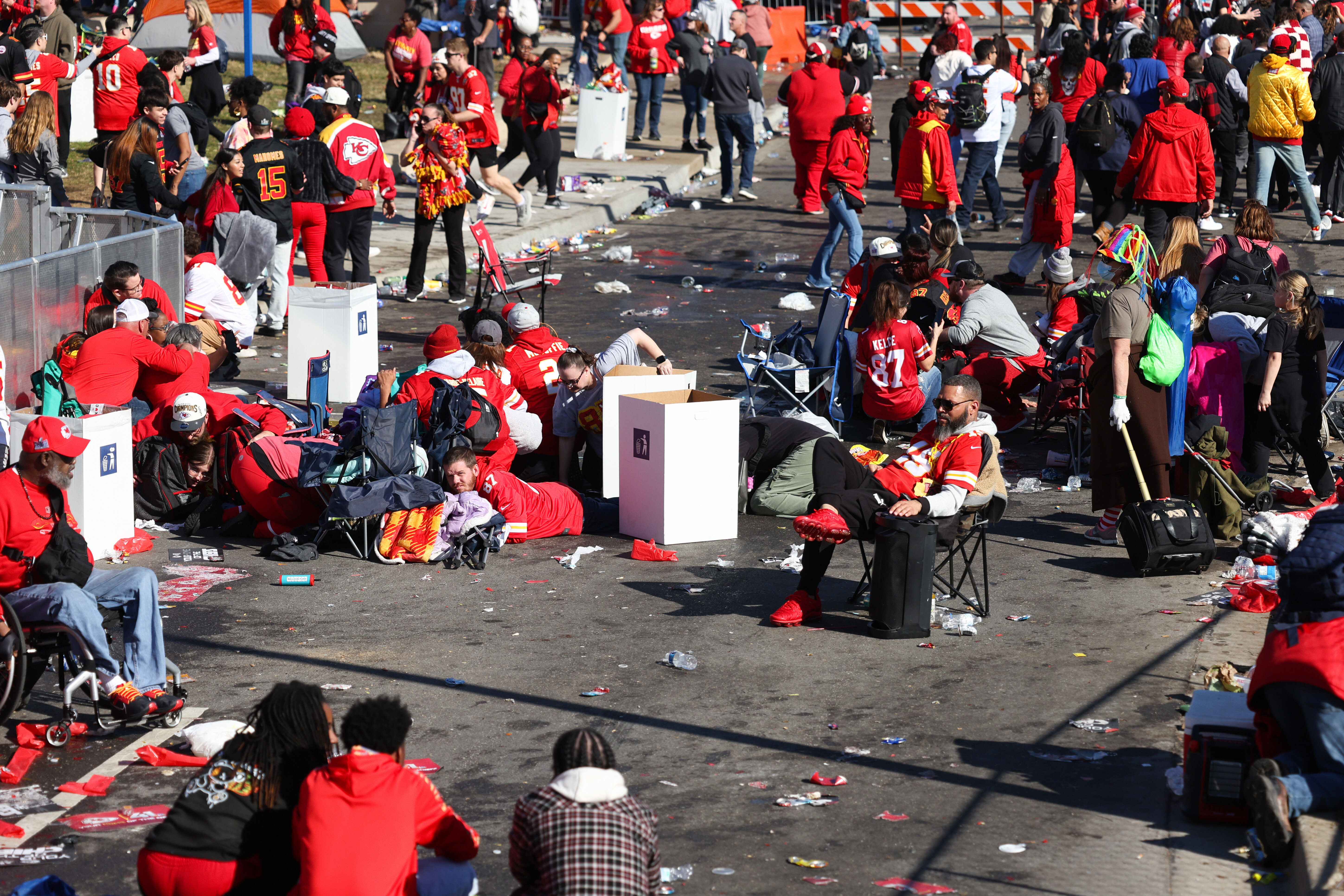 People take cover during a shooting at Union Station during the Kansas City Chiefs Super Bowl LVIII victory parade on Wednesday in Kansas City, Missouri.