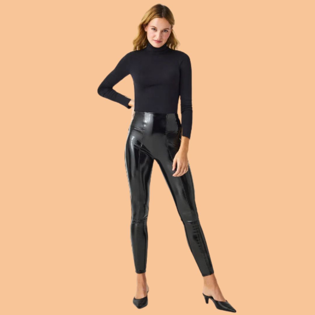 Model wearing high-rise faux leather leggings