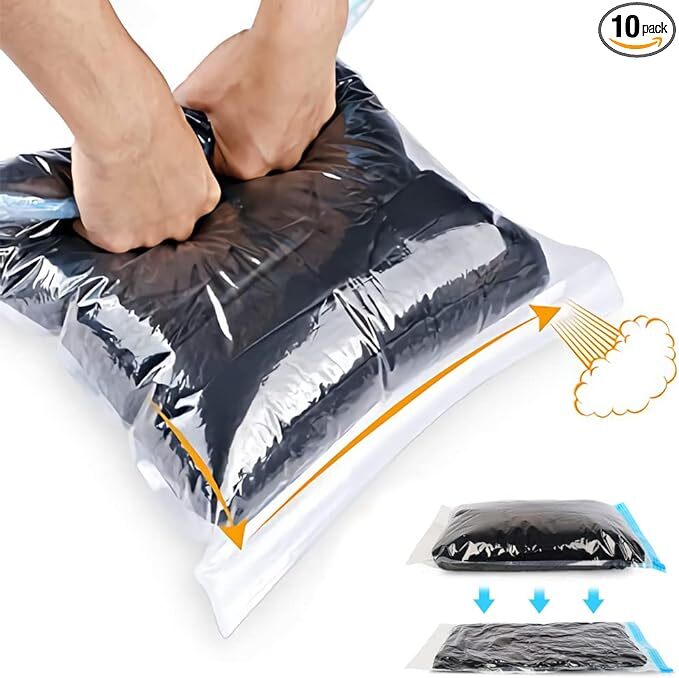 Hands compressing a vacuum-sealed bag to reduce volume for storage