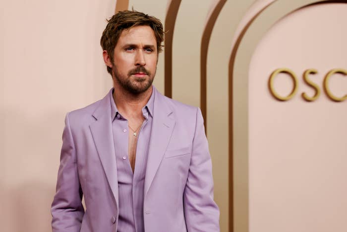 Ryan Gosling in a pink and purple blazer and matching shirt