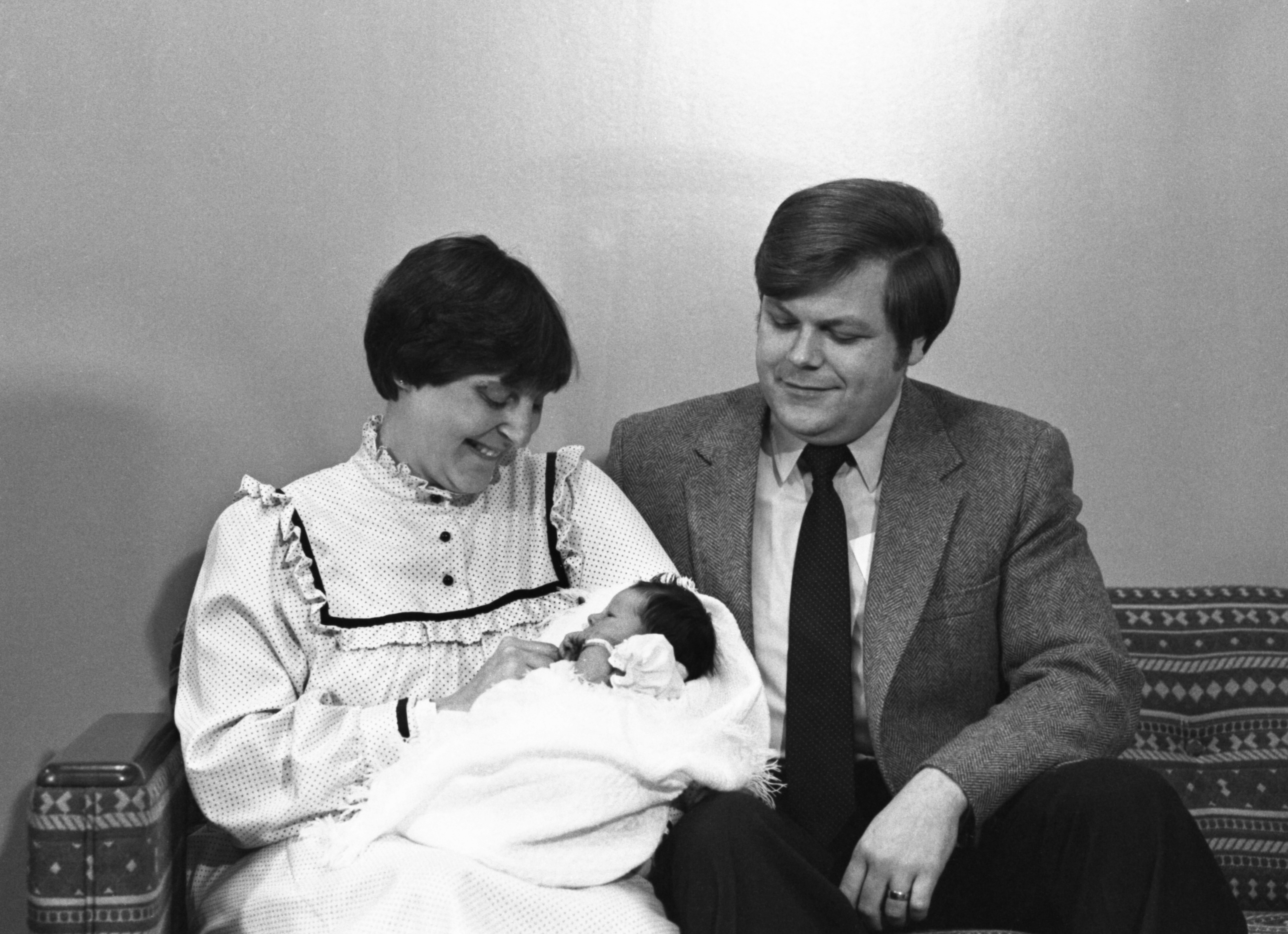 Judith Carr holds her newborn daughter, Elizabeth, alongside her husband, Roger Carr, in 1981