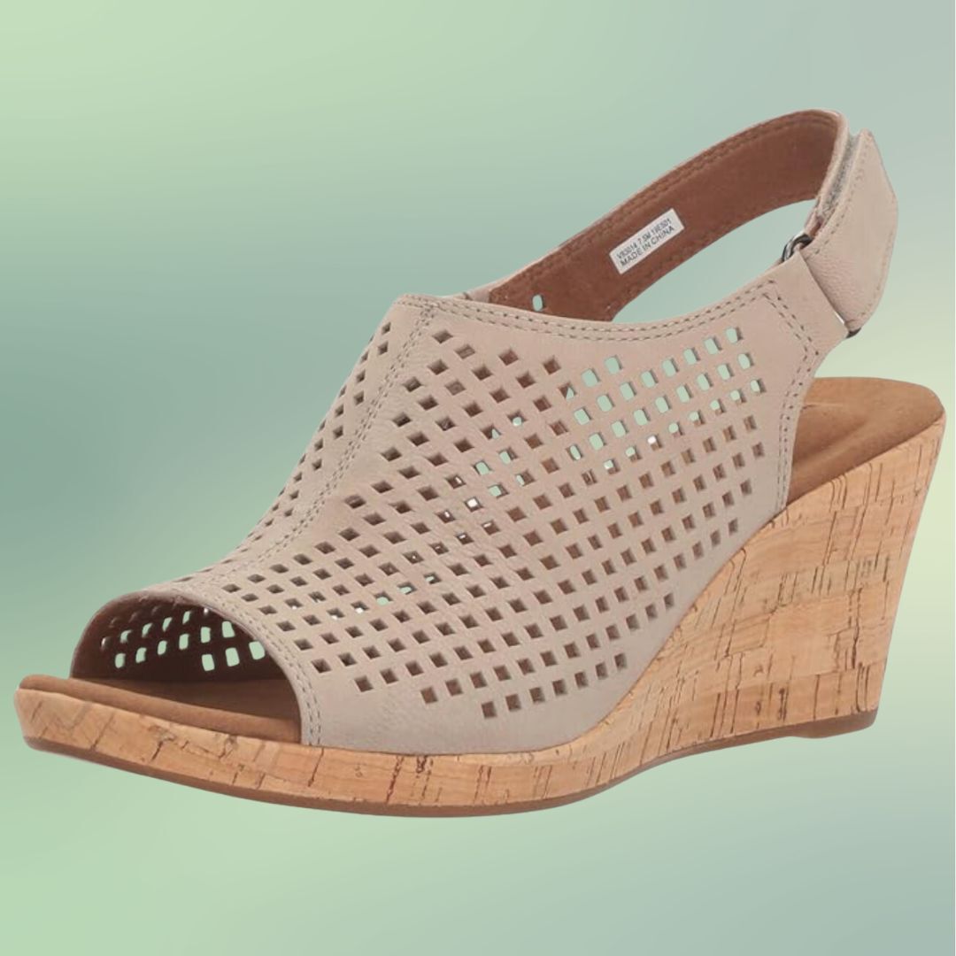 Beige wedge heel sandal with a perforated upper design and cork base