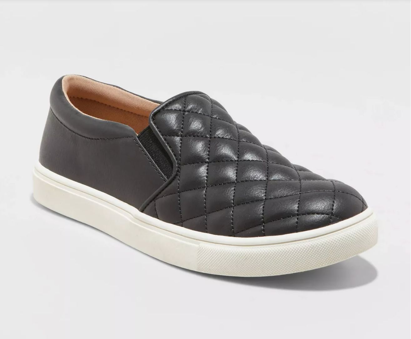 A black quilted leather slip-on sneaker