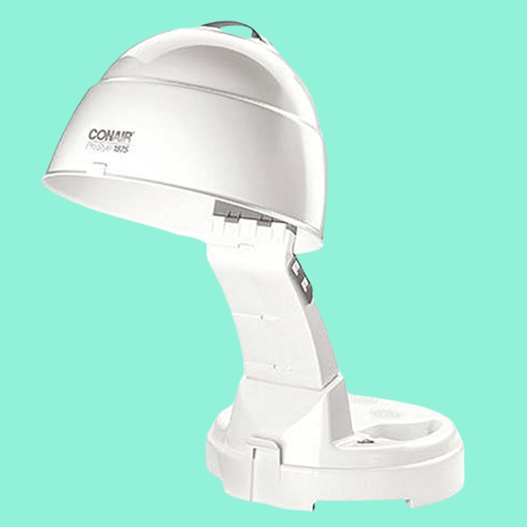 A white Conair hooded dryer against a light blue background