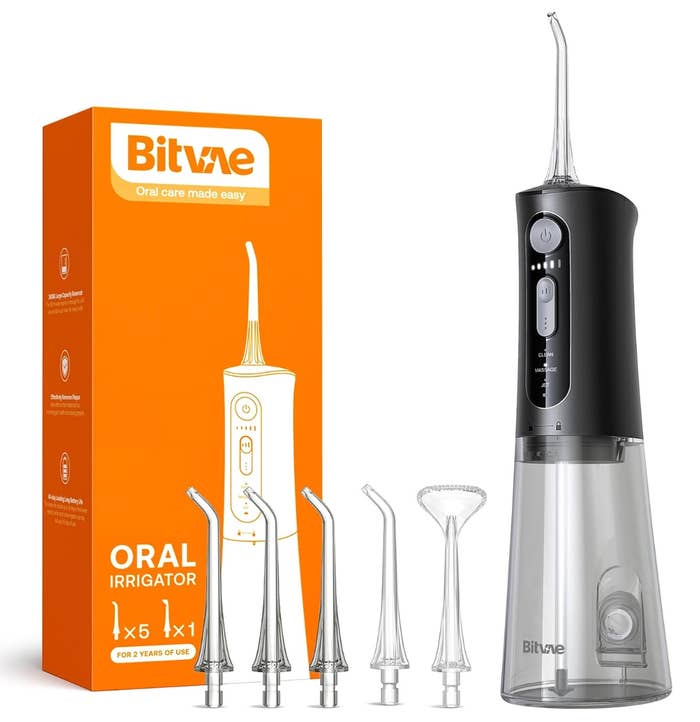 Electric oral irrigator with aggregate  nozzles and settings, packaged with an orangish  box. Featured successful  a buying  article