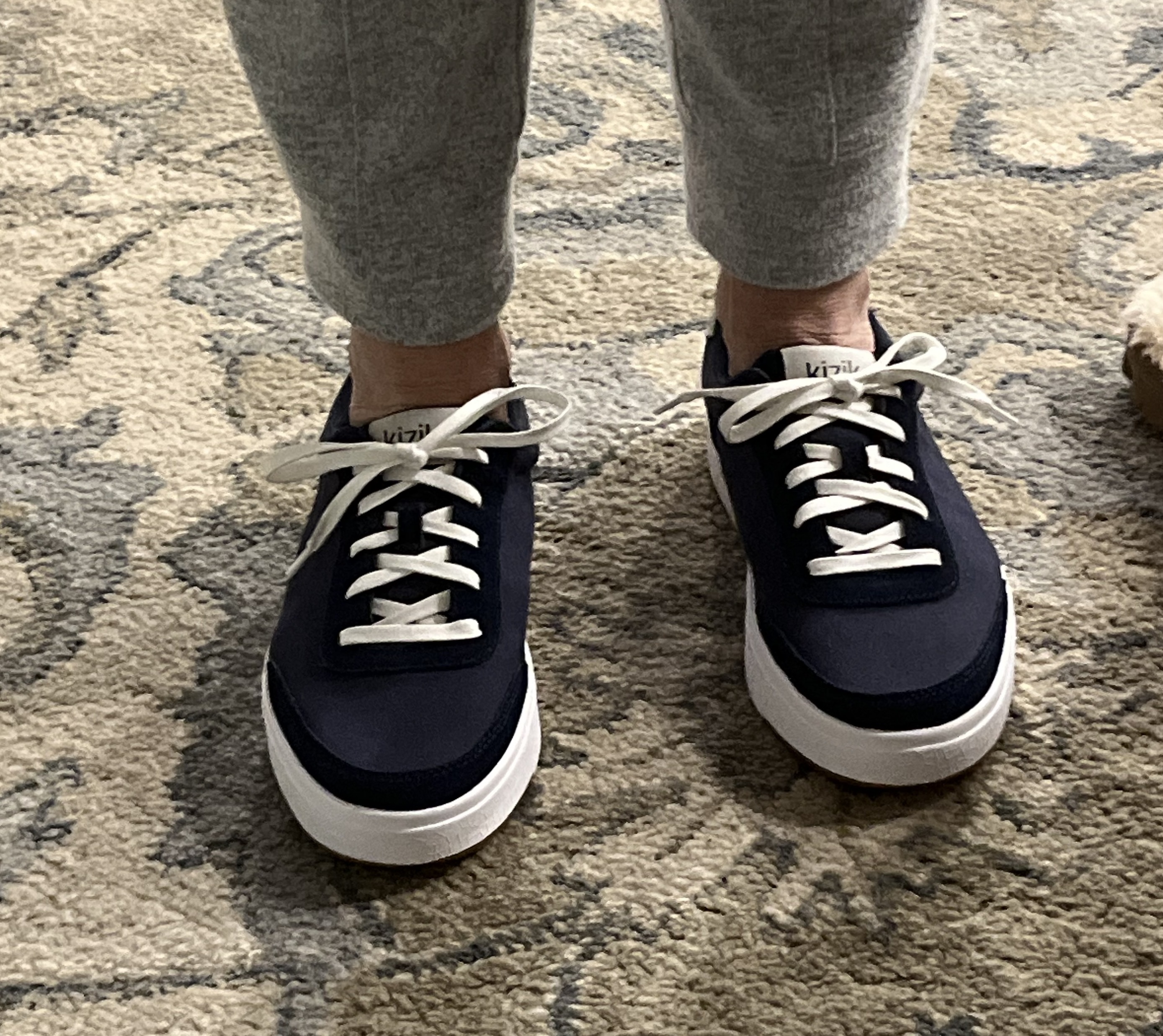 Reviewer wearing the navy shoes