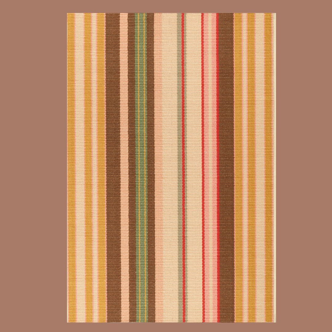 A yellow, brown, green, red, and cream striped rug on a beige background
