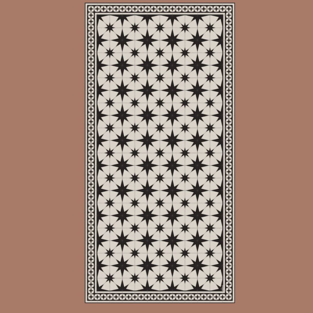 A black and white starburst pattern mat on a beige background