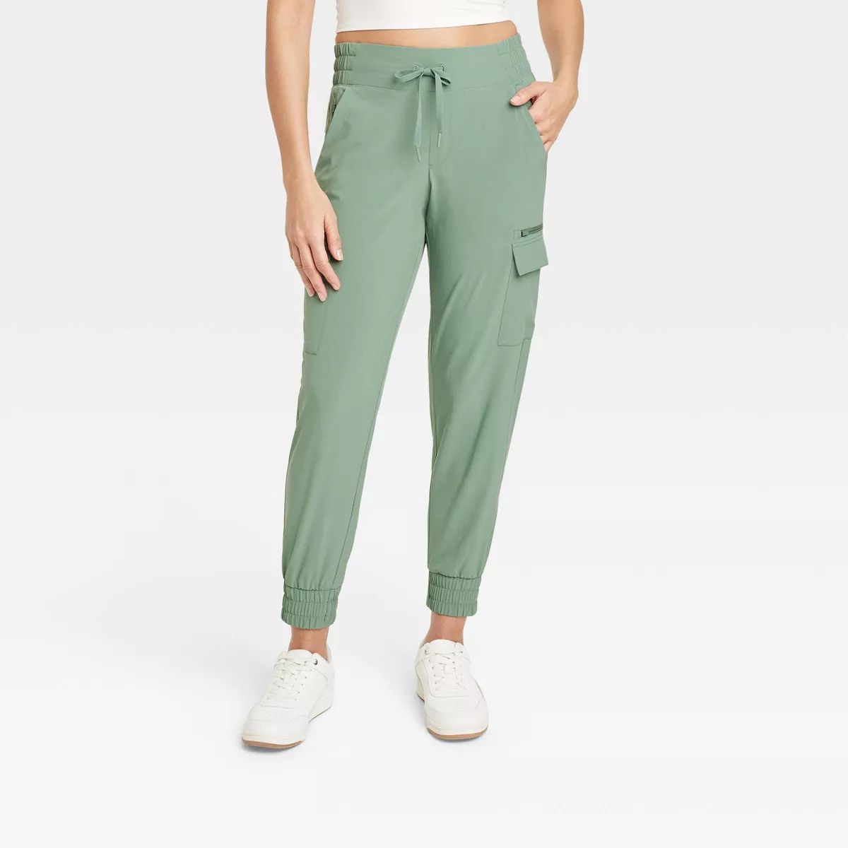 Model wearing the green pants