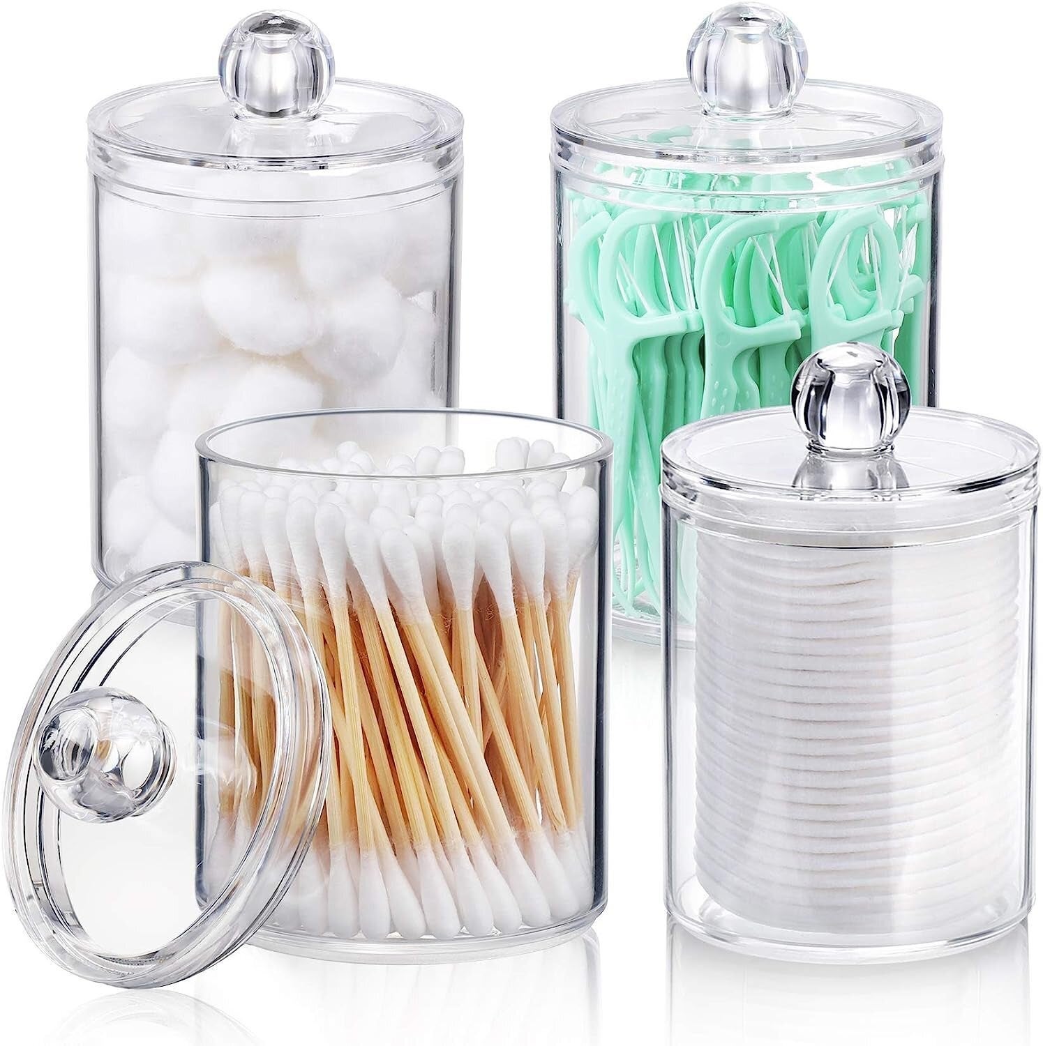 Clear containers clasp fabric balls, swabs, flossers, and pads, perfect for organizing a bath oregon vanity