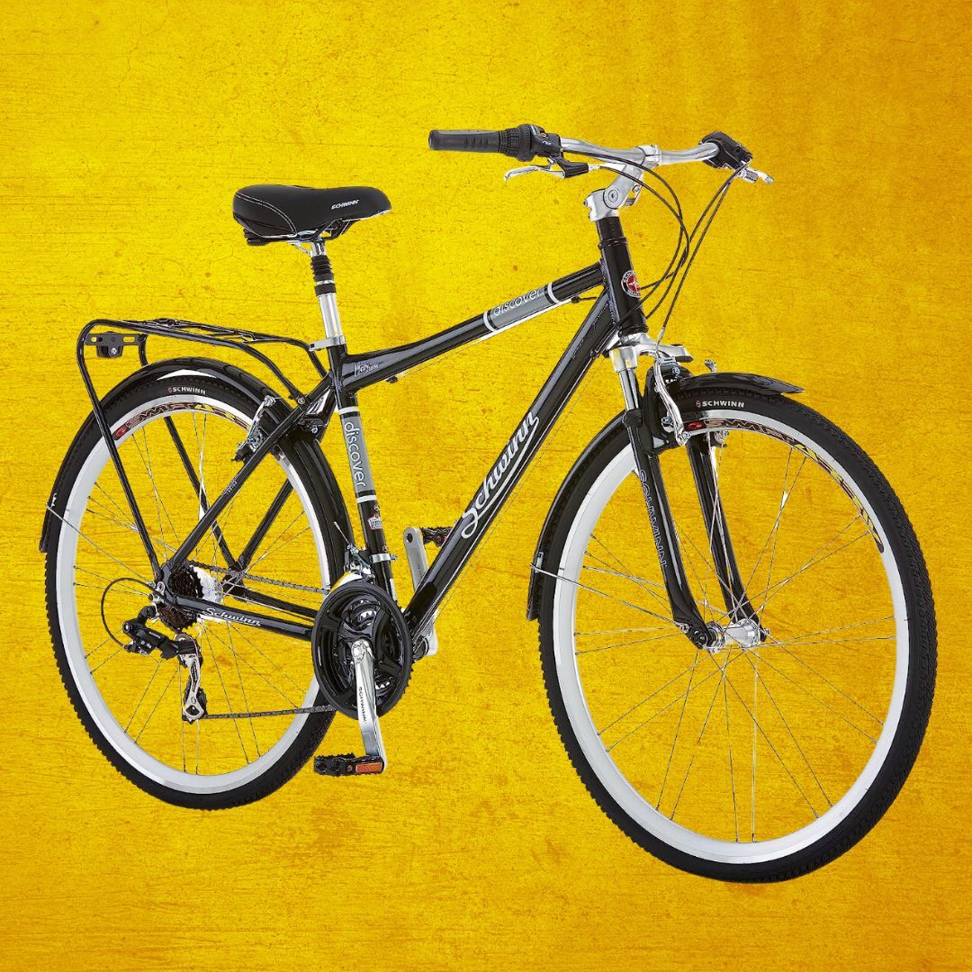 Sepeda Schwinn hitam dengan latar belakang kuning