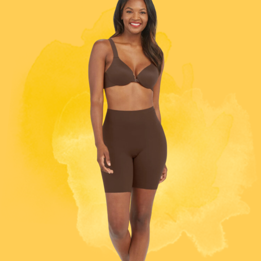 Person wearing a matching acceptable of seamless undergarments. They are smiling and lasting against a elemental background