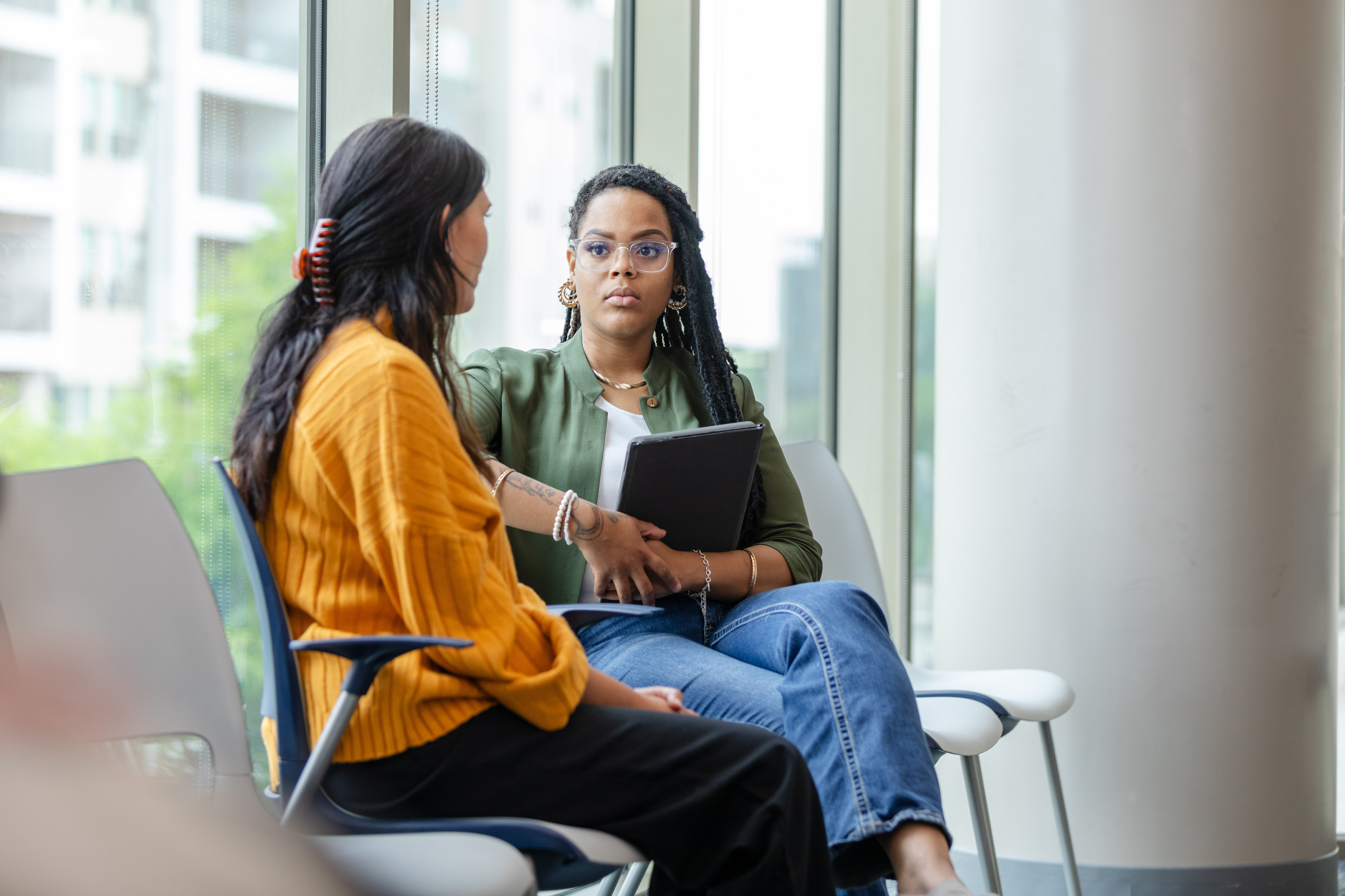 woman talking to a counselor