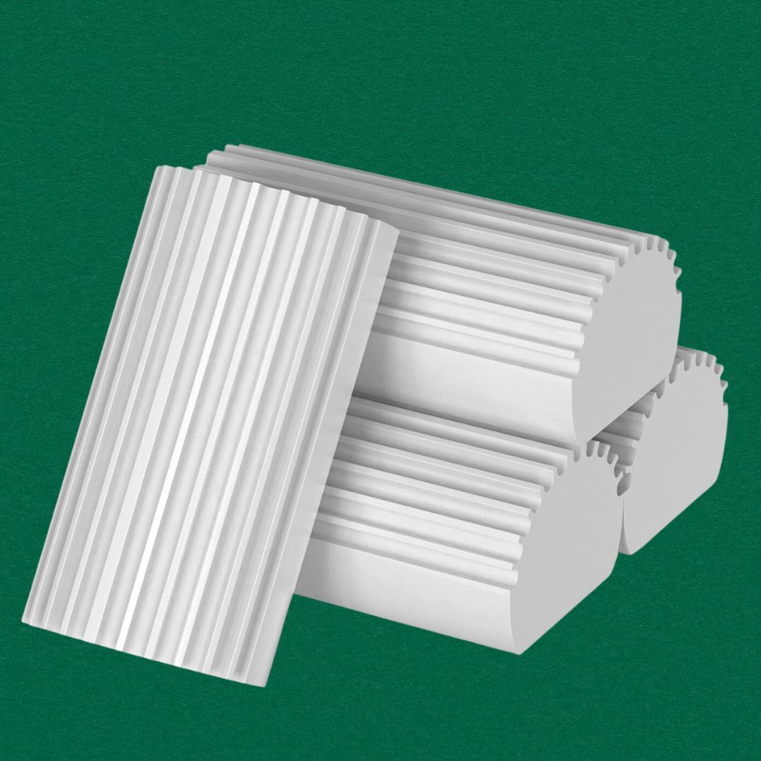 Stack of 4  white, textured foam blocks arranged connected  a greenish  surface, perchance  for crafting oregon  decor purposes