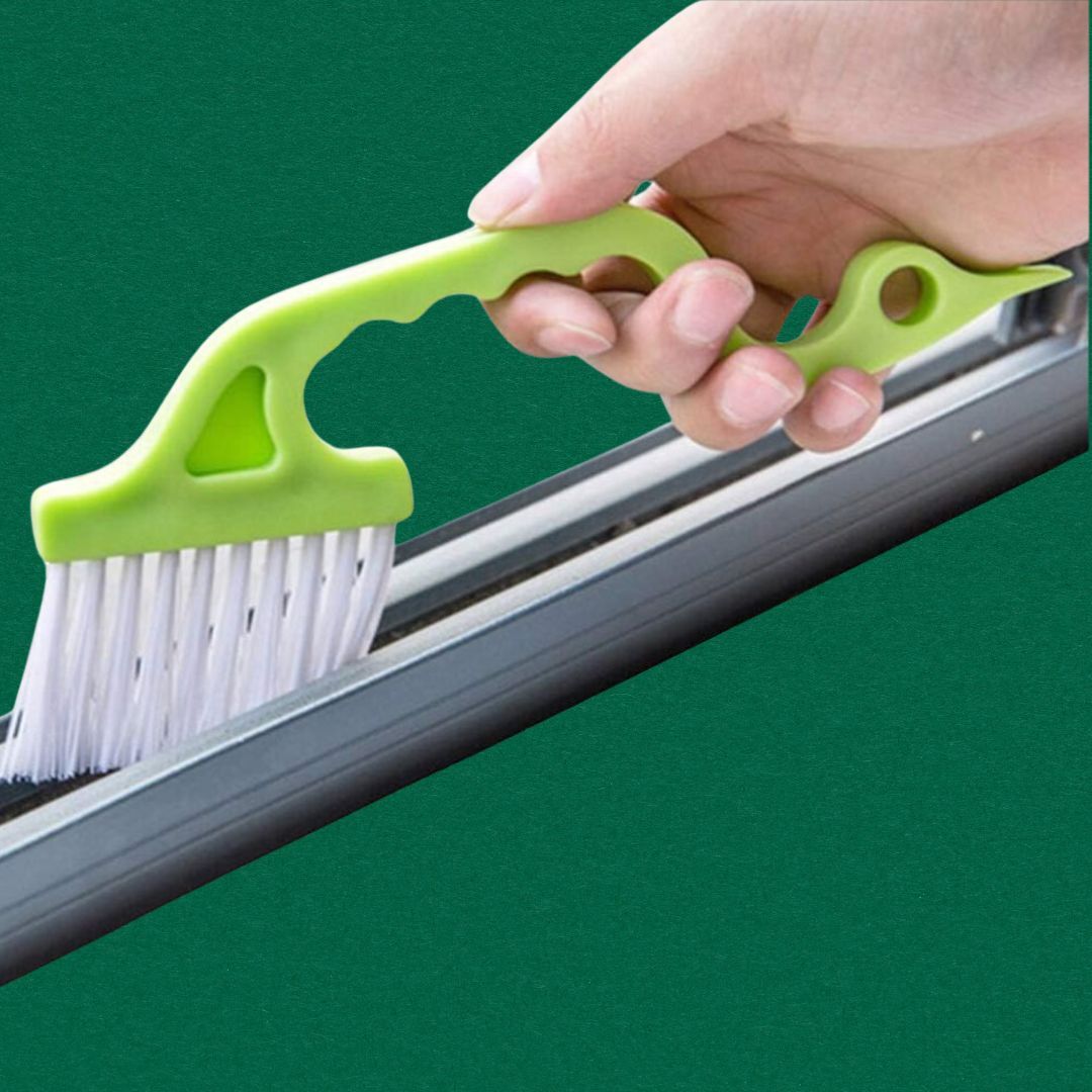 Hand utilizing a tiny  brushwood  to cleanable  a model   track. Ideal for location  cleaning tasks