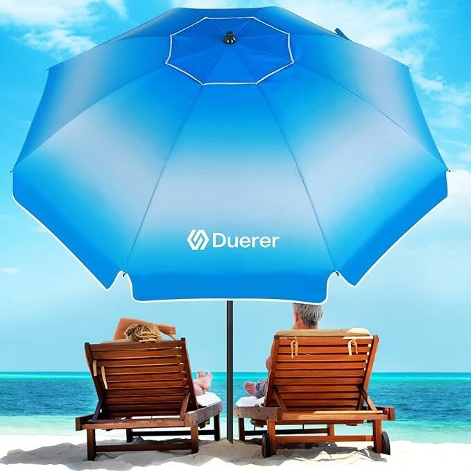 Two people relaxing seated on wooden lounge chairs under a blue gradient Duerer beach umbrella by the ocean