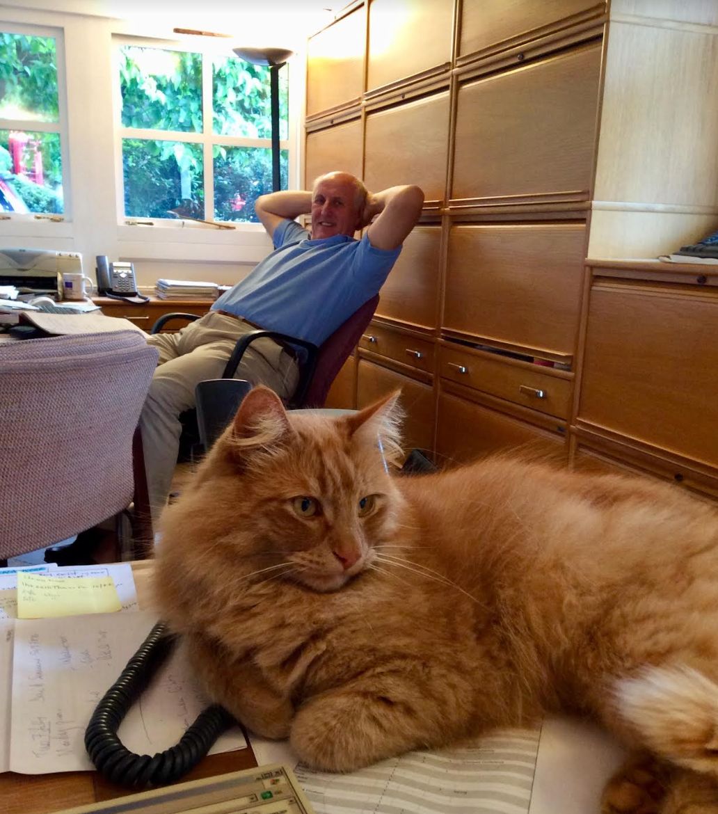 Simon relaxing in the home office with Softie, our cat, in 2015