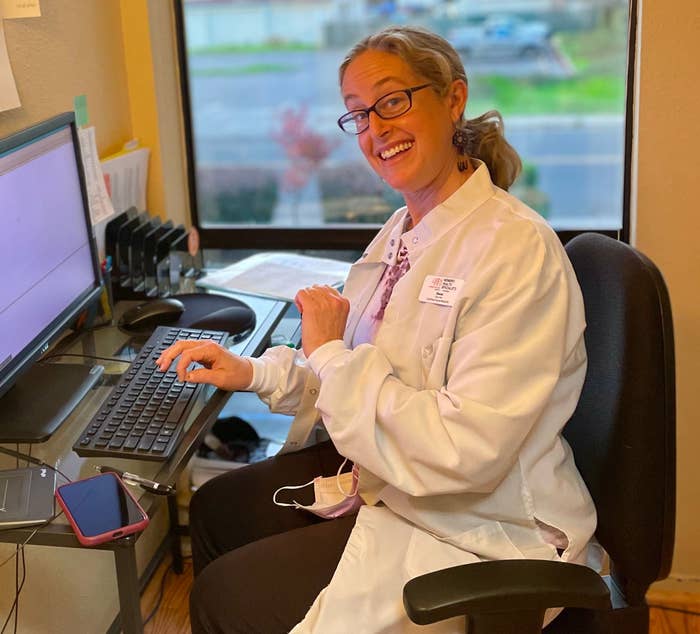 The author, who is smiling because she just finished updating the chart on her last patient before a Thanksgiving break