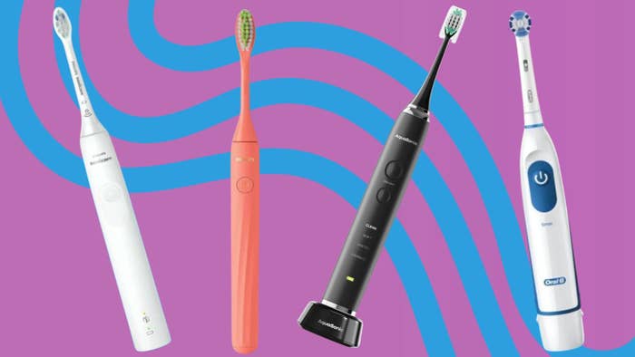 Four electrical  toothbrushes displayed vertically. Different brands and styles showcased against a patterned background