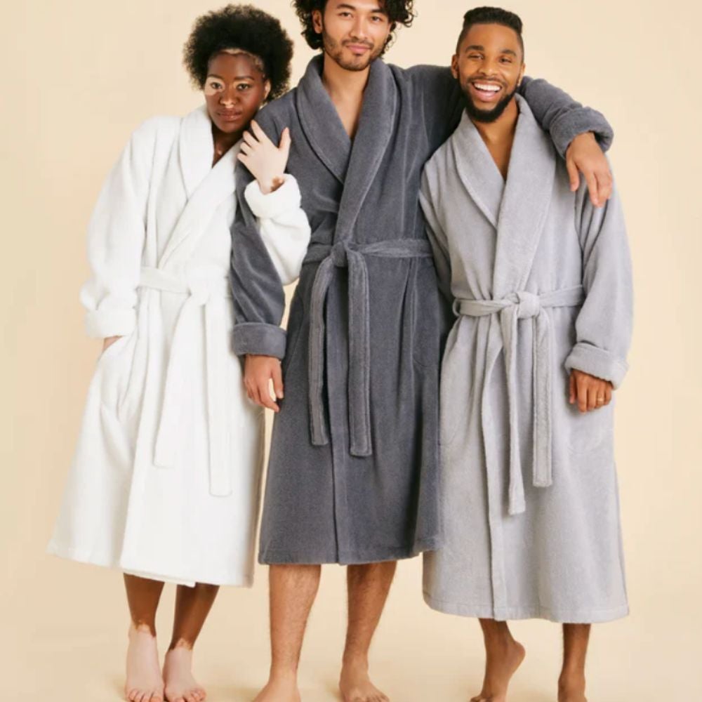 Three models successful  cozy bathrobes basal   broadside  by side, displaying comfy  loungewear options for shopping