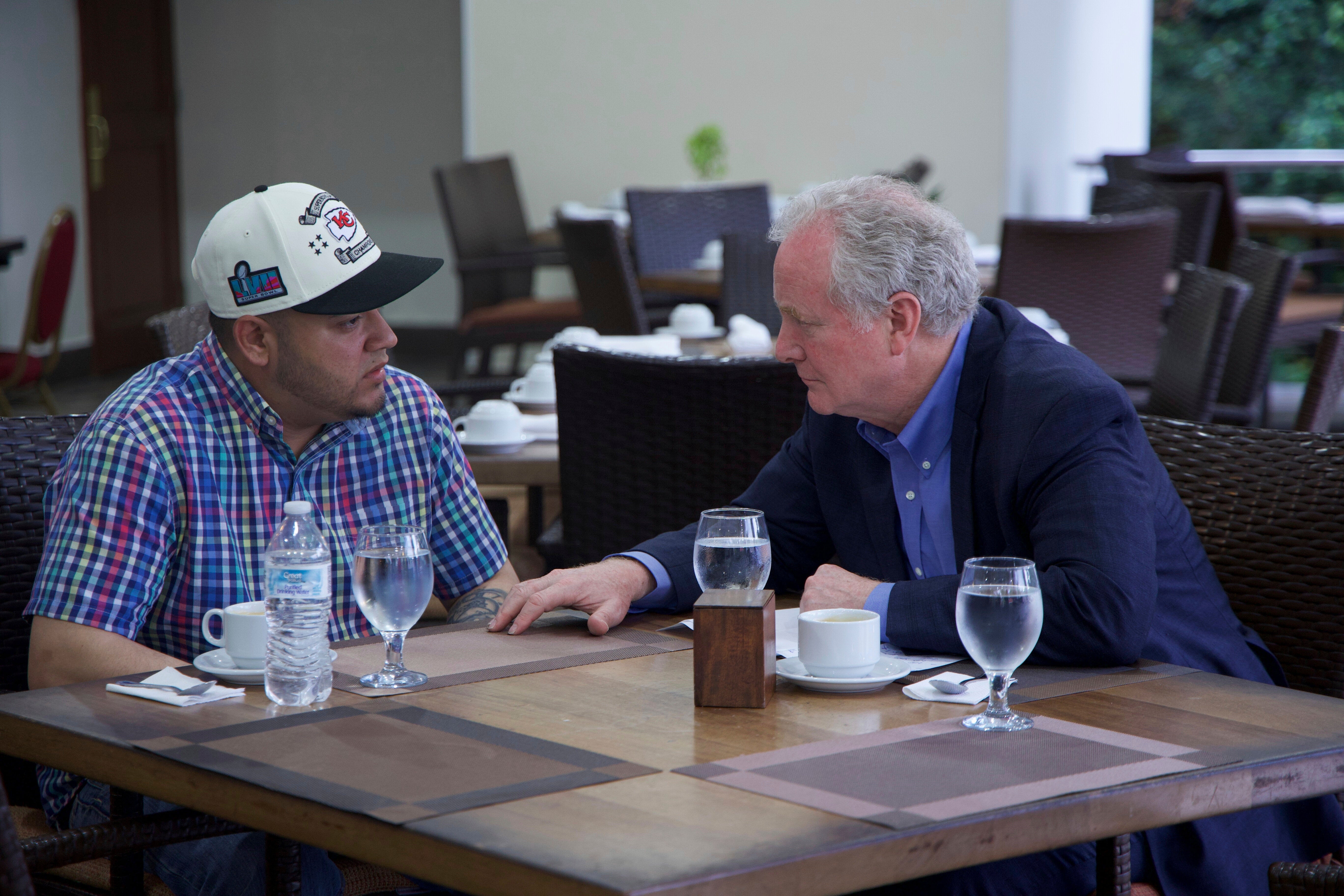 Kilmar Abrego Garcia, left, is the only person known to see the outside of El Salvador's CECOT prison when he met Sen. Chris Van Hollen (D-Md.).