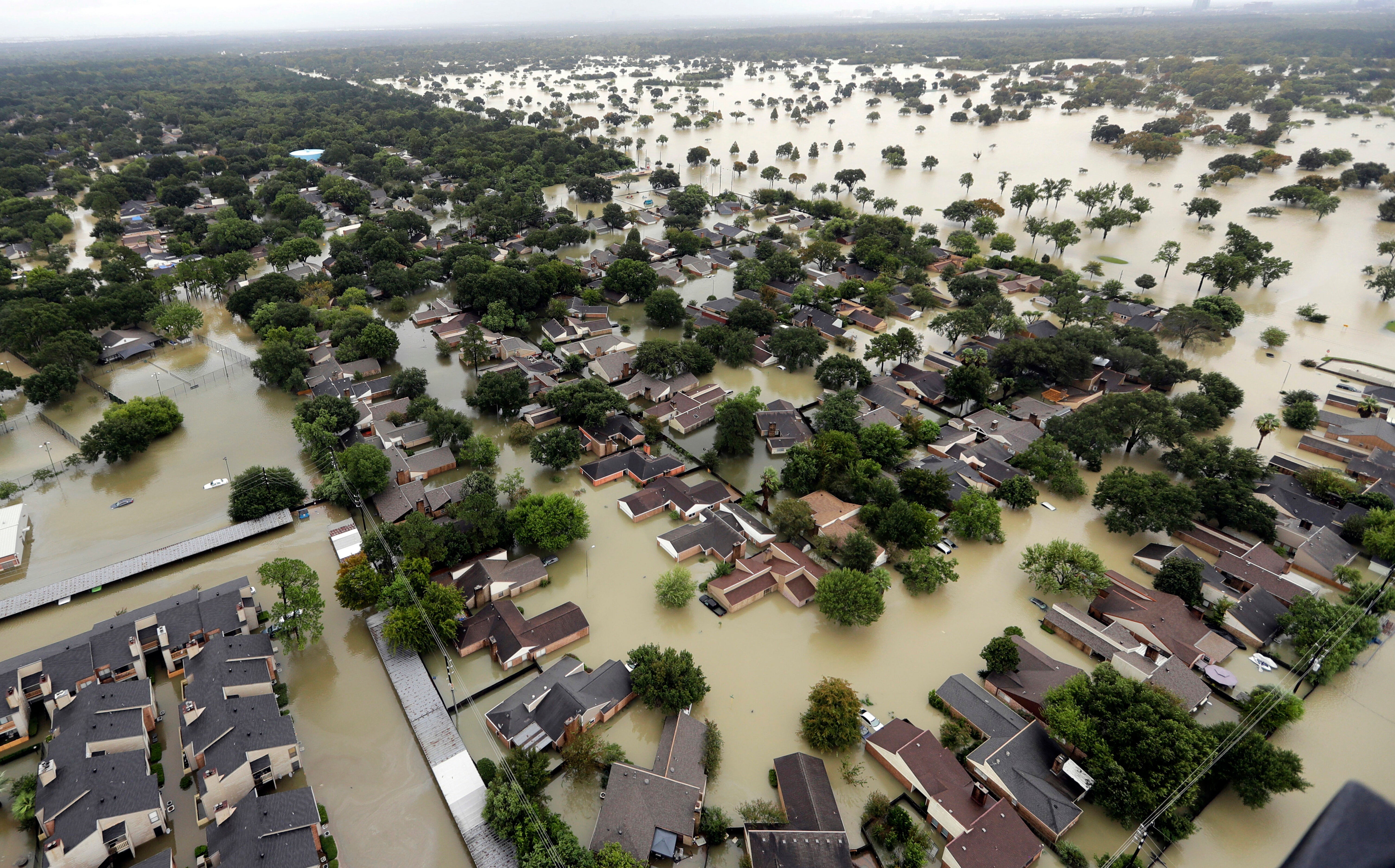 A Houston neighborhood is seen underwater in 2017 after Hurricane Harvey struck the area, causing an estimated $125 billion in damage