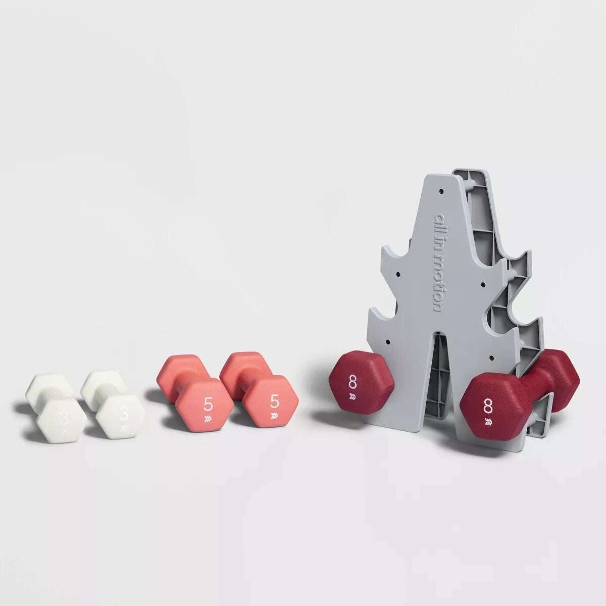 Dumbbell set with weights from 3 to 8 lbs, includes a stand for organized storage