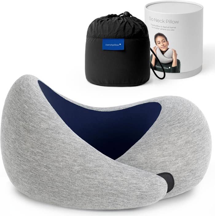Neck pillow with supportive plan shown successful beforehand of its question pouch and packaging container featuring a idiosyncratic objection image