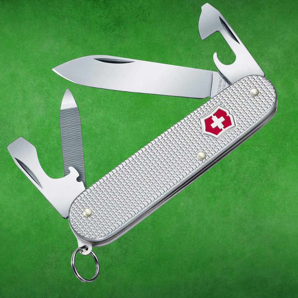 Swiss Army weapon  with aggregate  tools extended, including blades and openers, against a greenish  background. Ideal for versatile usage  and portability