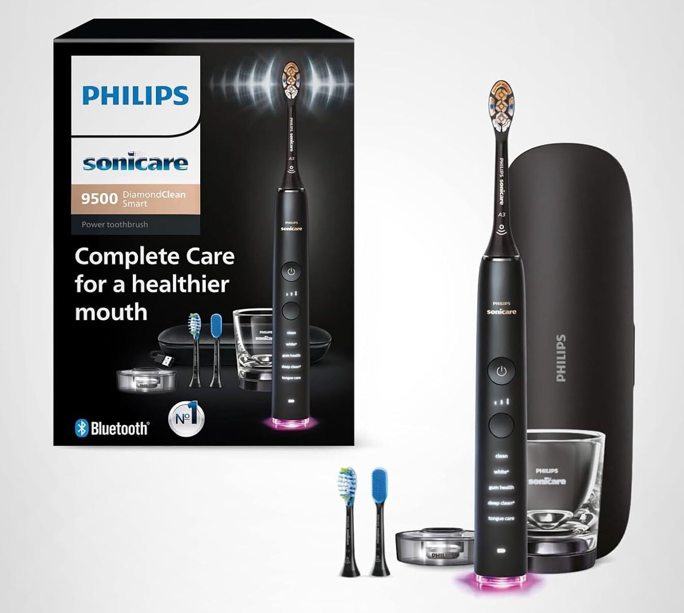 Philips Sonicare 9500 electrical toothbrush acceptable with charger, case, and aggregate brushwood heads. Packaging highlights implicit oral attraction benefits