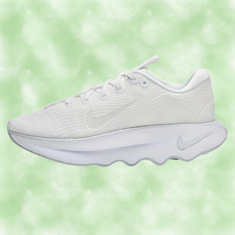 White diversion  sneaker with a lightweight, cushioned sole, connected  a cloudy greenish  background