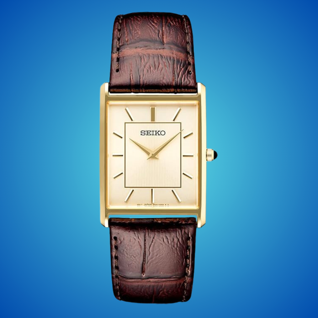 Seiko rectangular gold-tone ticker  with a textured brownish  leather strap, shown against a bluish  background