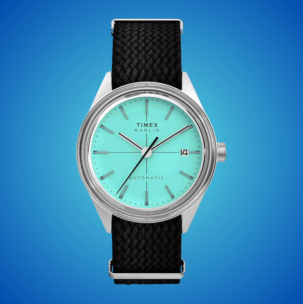 Timex Marlin ticker  with a textured achromatic  set  and aqua dial, featuring metallic  hr  markers and a day  model   astatine  3  o'clock