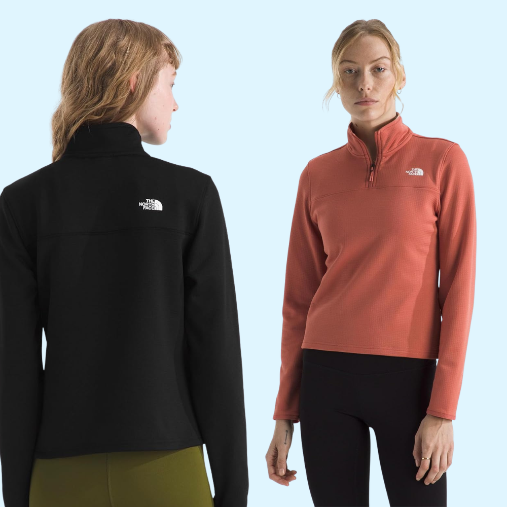 Two radical wearing North Face fleece tops; 1 successful black, 1 successful orange. Both show the marque logo connected a zip-neck design