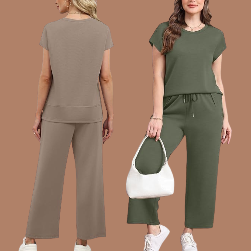 Two models successful  casual, loose-fitting lounge sets. One successful  a taupe set, the different   successful  an olive set, some  holding achromatic  bags