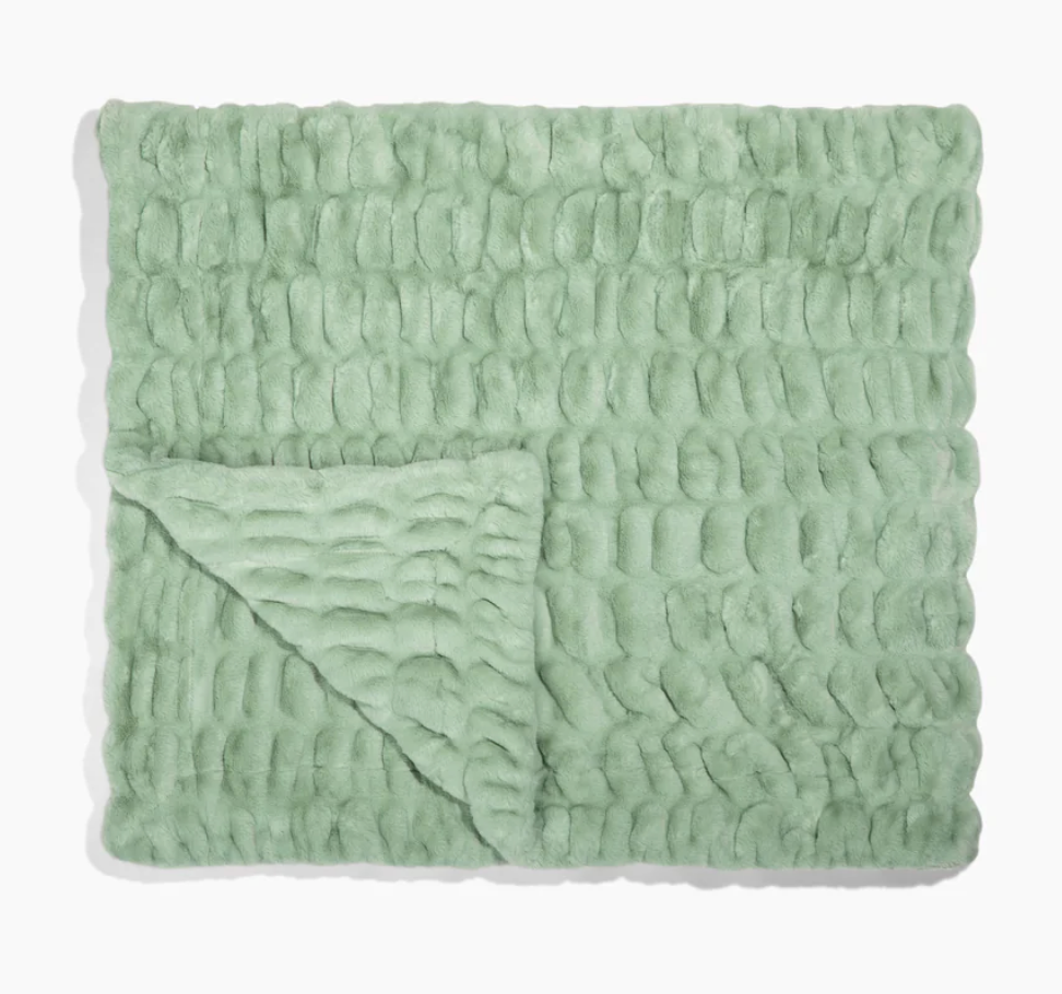 Plush faux fur broad  with a textured, luxurious plan  displayed connected  a level  surface