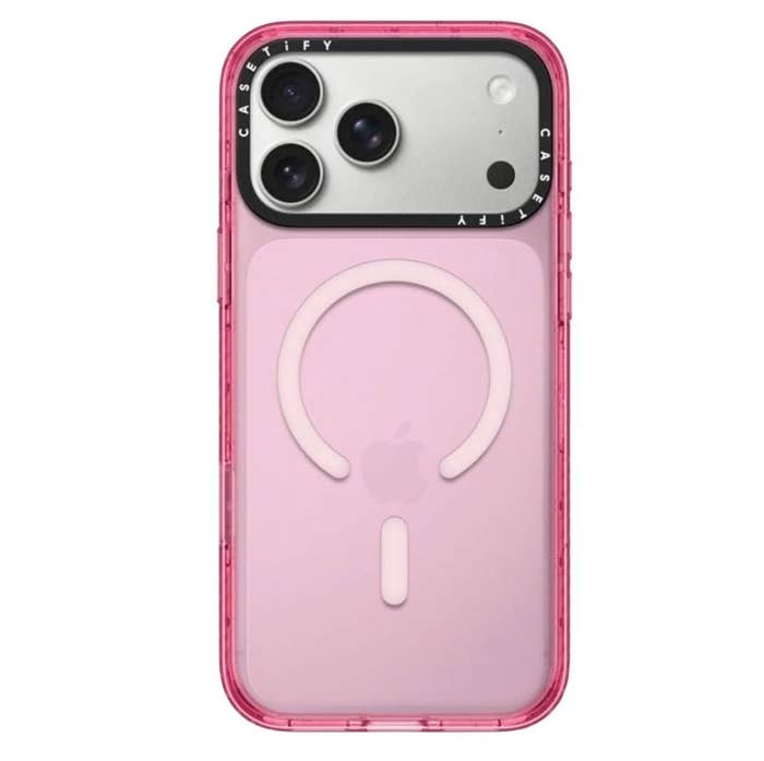 Back presumption    of a smartphone successful  a pinkish  lawsuit  with a circular plan  astir   the Apple logo, featuring 3  camera lenses