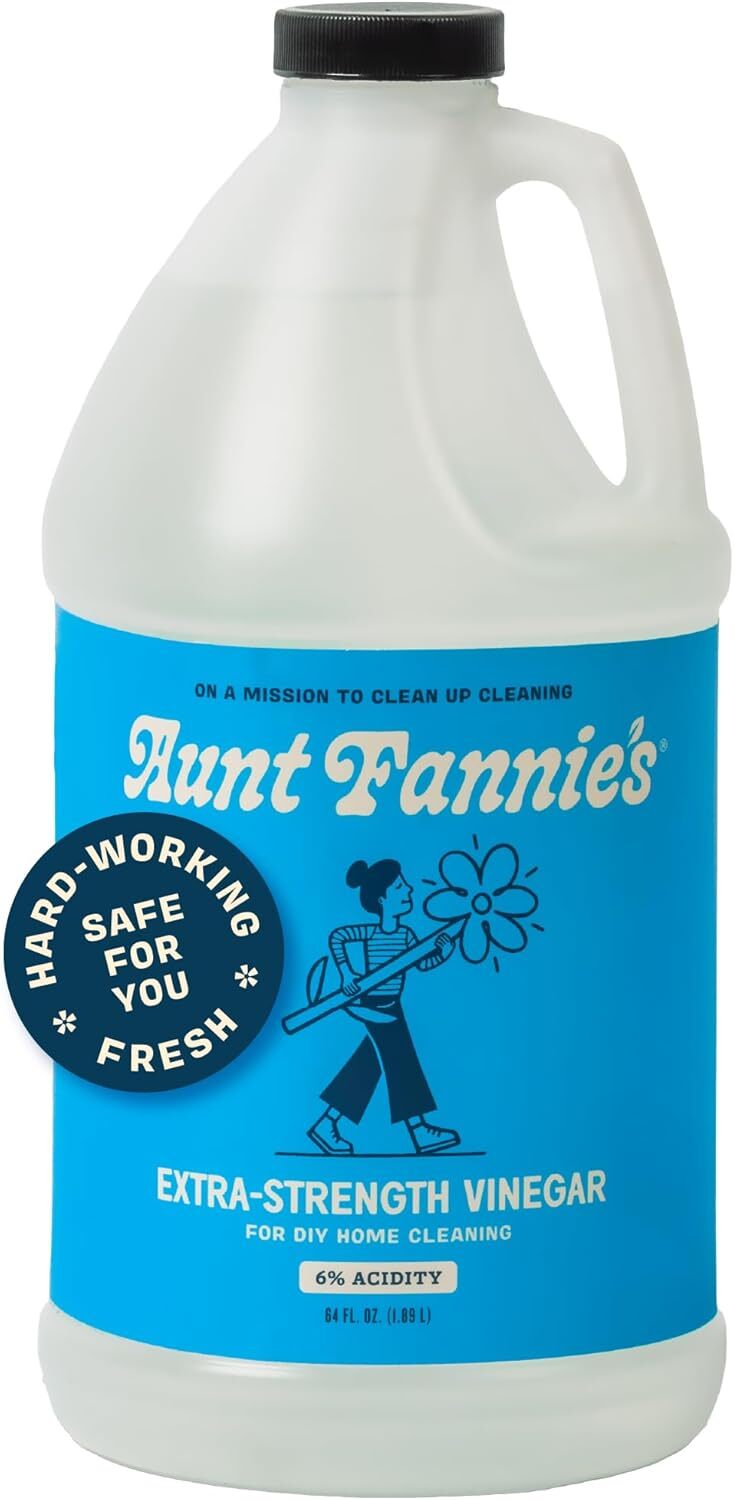 Aunt Fannie's Extra-Strength Vinegar jug with "Hard-working, Safe for You, Fresh" connected  label, utilized  for DIY location  cleaning