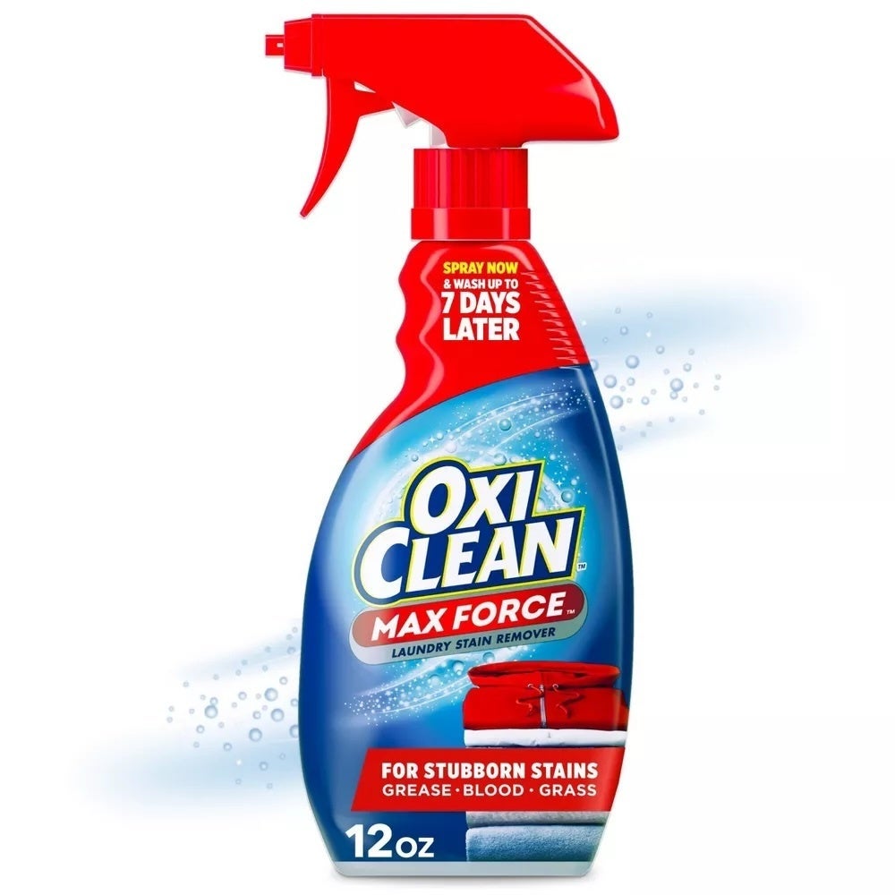 OxiClean Max Force spray vessel  for laundry stain removal, highlighting its effectiveness connected  stubborn stains similar  grease, blood, and grass