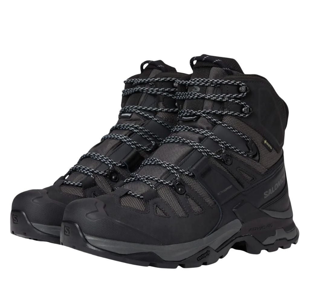 Hiking boots with rugged soles and lace-up design, suitable for outdoor activities