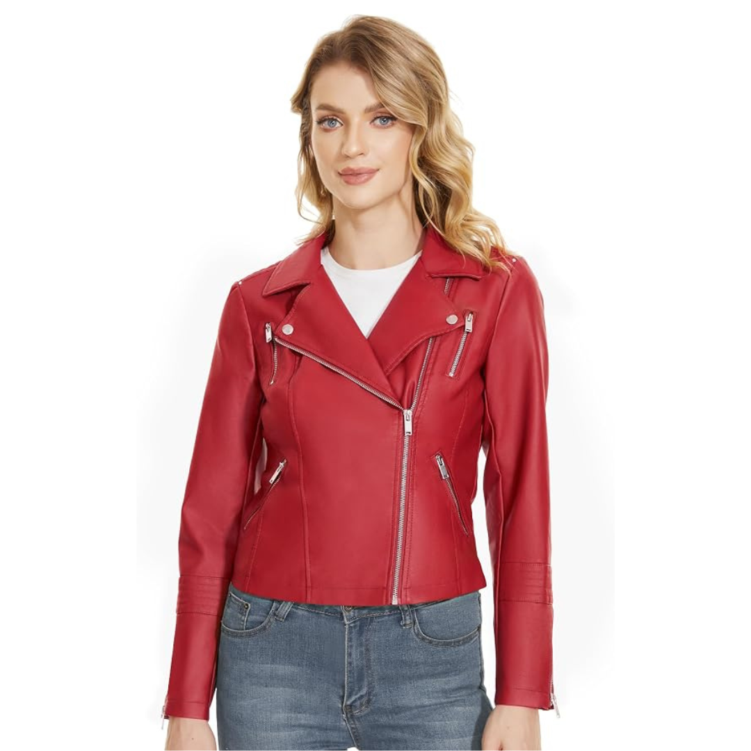 Woman wearing a stylish leather overgarment with zipper details, paired with jeans