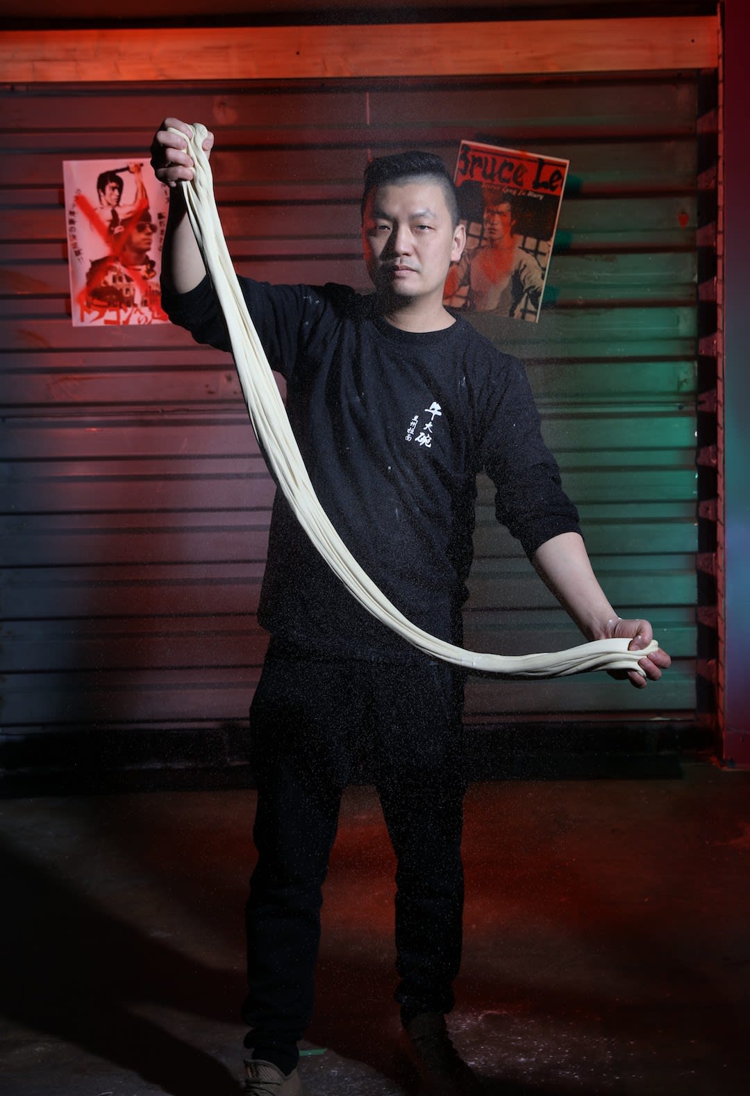 Evan from Big Beef Bowl in Superfresh pulling noodles