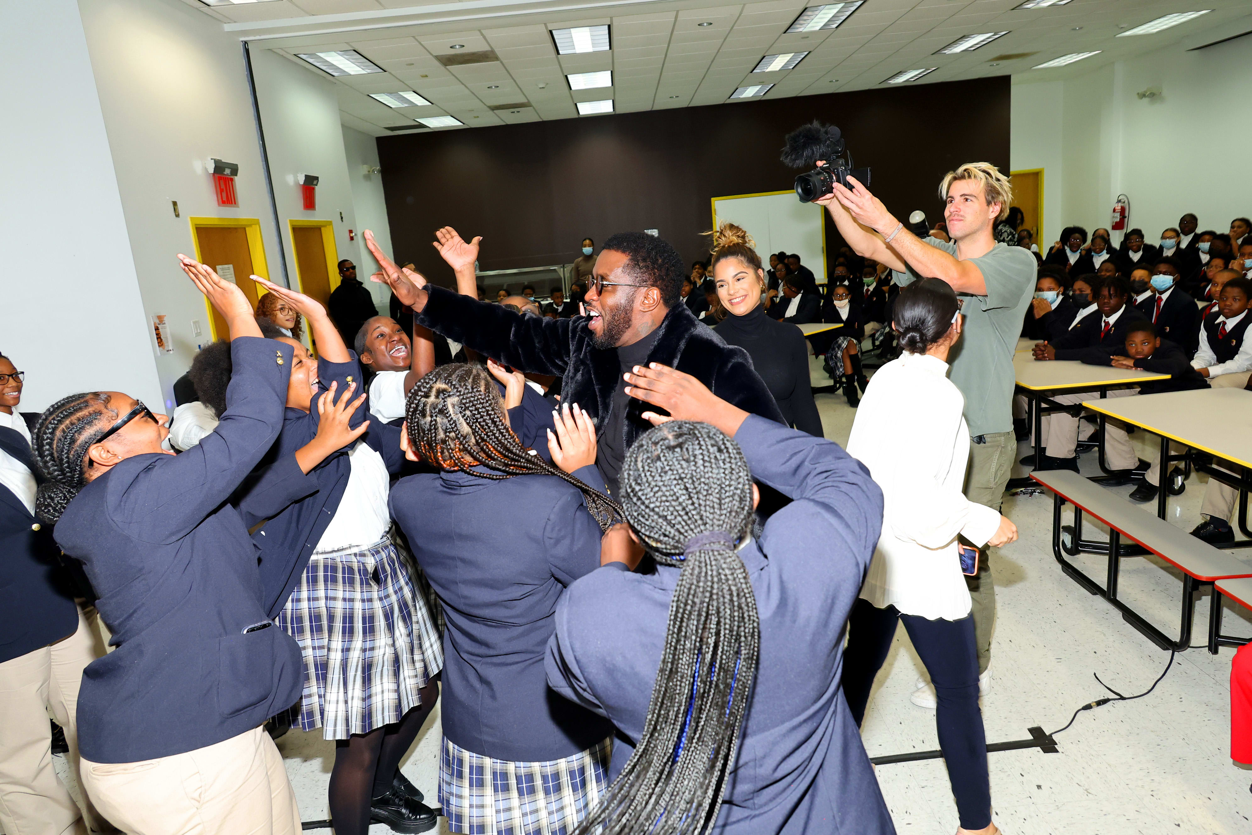 sean combs diddy visits school in the bronx